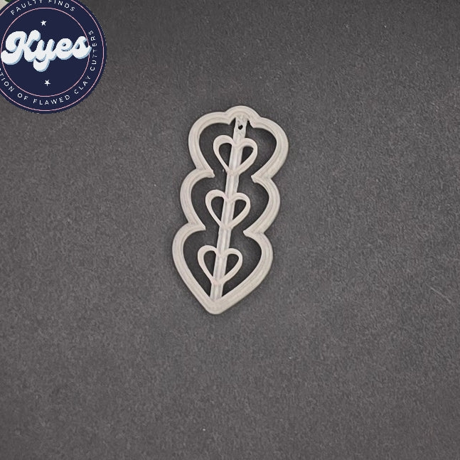 Kyes faulty finds 55mm 3 heart dangle