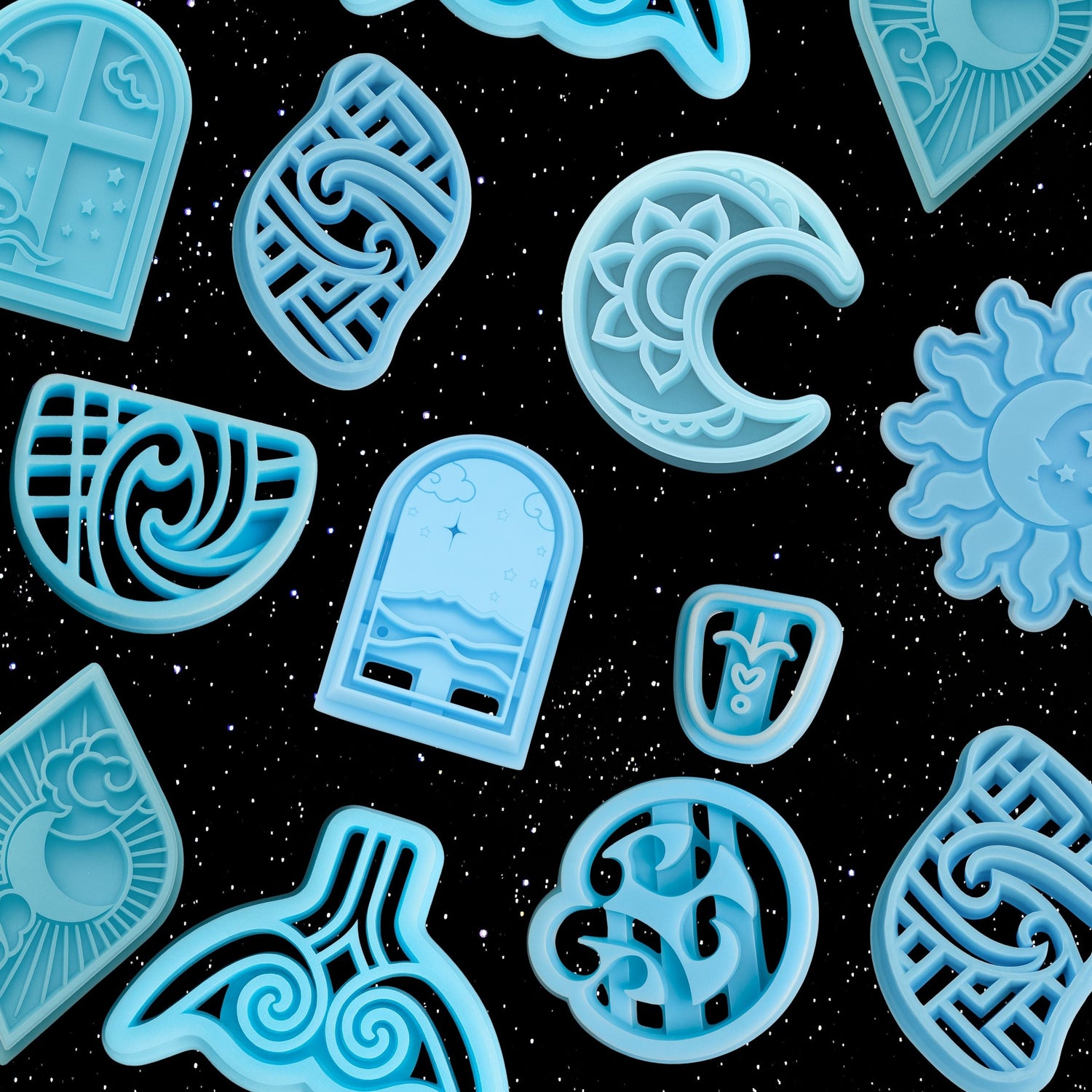 Matariki-inspired blue polymer clay cutters featuring celestial and symbolic shapes like moons, stars, suns, waves, and Māori motifs. Set against a starry black night sky background.