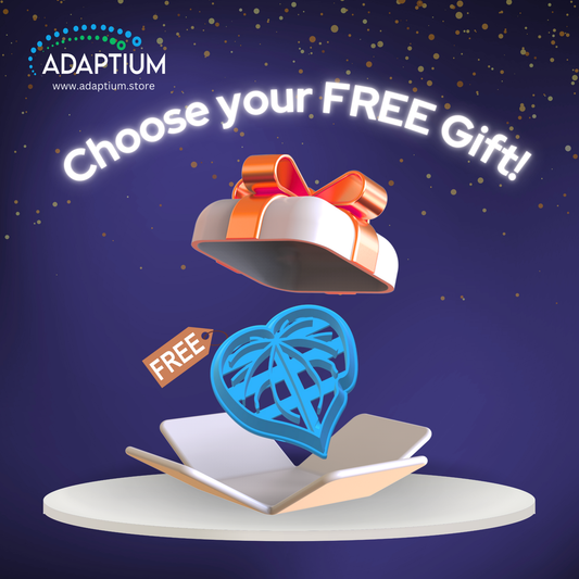 Adaptium promotional banner with a floating gift box, ribbon, and a free blue heart-shaped leaf cutter popping out. Text reads ‘Choose your FREE Gift!’ on a dark starry background. Website www.adaptium.store displayed at the top.
