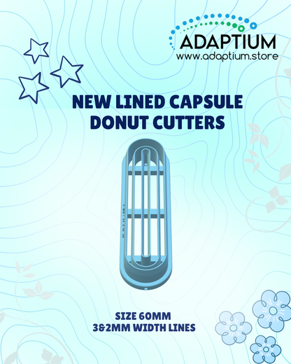 Lined capsule donut cutters on a blue background with floral designs.