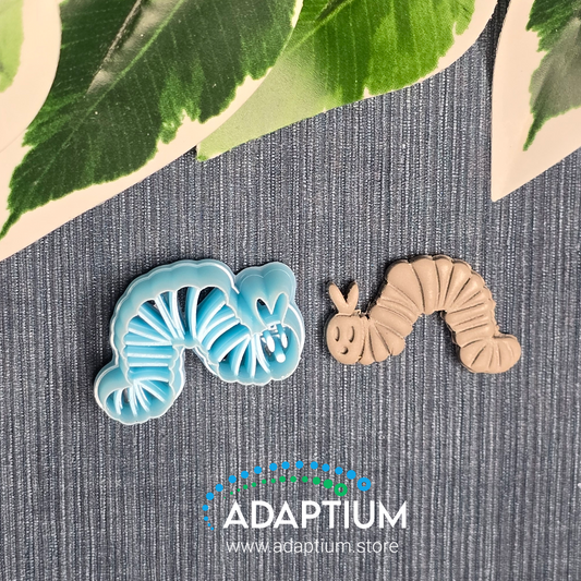 Sharp, sky blue Caterpillar resin cutter for polymer Clay
