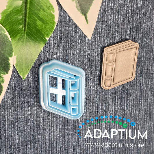 Sharp, sky blue resin book cutter for polymer Clay